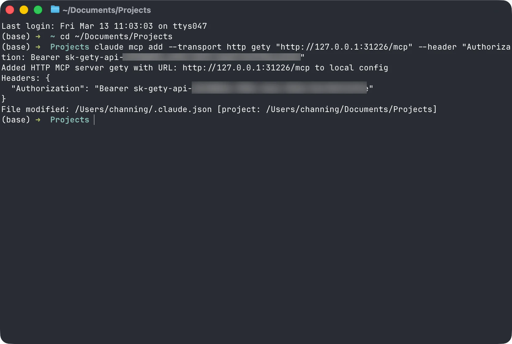 Terminal showing the claude mcp add command executed successfully